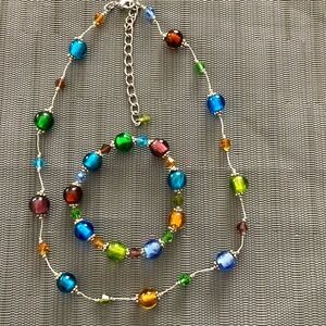 Matching multi colored beaded necklace and bracelet set